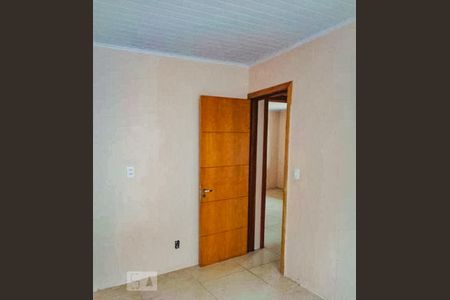 Dormitório de casa à venda com 3 quartos, 100m² em Vila Nova, Porto Alegre