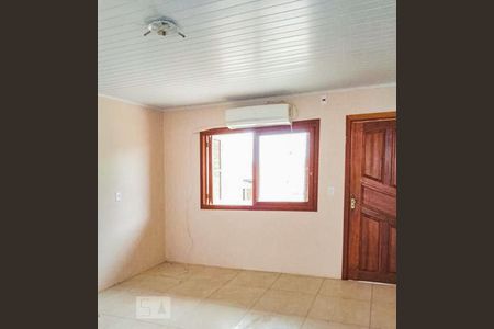 Sala de casa à venda com 3 quartos, 100m² em Vila Nova, Porto Alegre