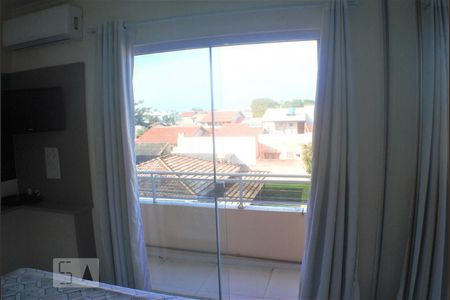 Porta da Sacada do Quarto 01 - Suíte de apartamento para alugar com 2 quartos, 60m² em Ingleses do Rio Vermelho, Florianópolis