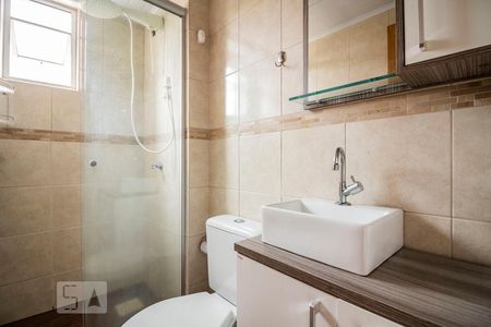 Banheiro de apartamento à venda com 1 quarto, 32m² em Vila Nova, Porto Alegre