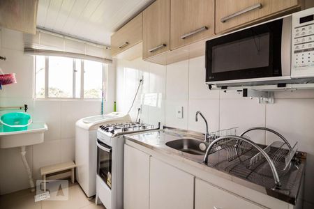 Cozinha de apartamento à venda com 1 quarto, 32m² em Vila Nova, Porto Alegre