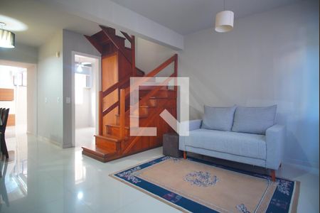 Sala de casa de condomínio à venda com 3 quartos, 79m² em Humaitá, Porto Alegre