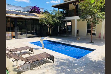 Casa de condomínio à venda com 402m², 4 quartos e 5 vagas