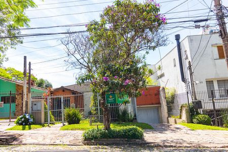 Casa à venda com 110m², 3 quartos e 2 vagas Casa à venda com 110m², 3 quartos e 2 vagasFachada