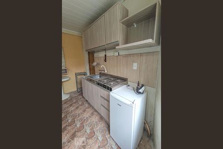 Sala e cozinha de kitnet/studio para alugar com 1 quarto, 16m² em Vicentina, São Leopoldo