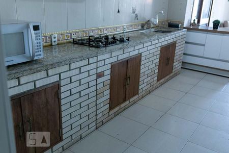 Cozinha de casa à venda com 3 quartos, 111m² em Santo Antônio, Porto Alegre