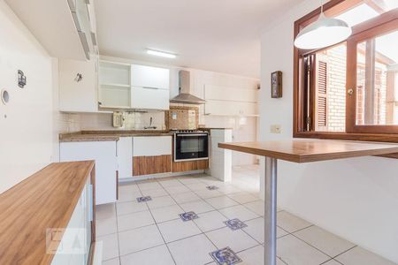 Cozinha de casa de condomínio à venda com 3 quartos, 220m² em Vila Nova, Porto Alegre