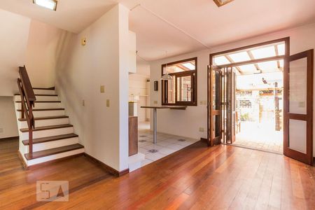 Sala de casa de condomínio à venda com 3 quartos, 220m² em Vila Nova, Porto Alegre