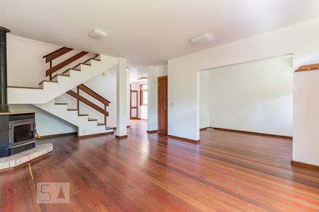 Sala de casa de condomínio à venda com 3 quartos, 220m² em Vila Nova, Porto Alegre