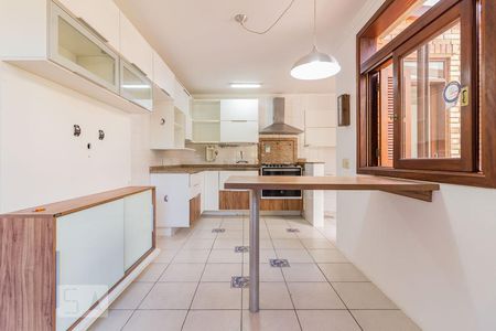 Cozinha de casa de condomínio à venda com 3 quartos, 220m² em Vila Nova, Porto Alegre