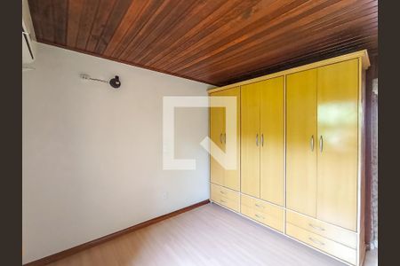 Quarto 1 de casa de condomínio para alugar com 2 quartos, 48m² em Vila Nova, Porto Alegre