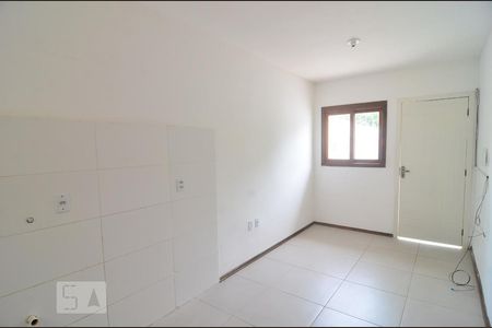 Sala e cozinha de casa à venda com 2 quartos, 44m² em Olaria, Canoas