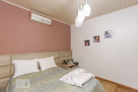 Dormitório 1  de casa à venda com 3 quartos, 160m² em São Geraldo, Porto Alegre