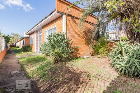 Fachada de casa de condomínio à venda com 1 quarto, 40m² em São José, Porto Alegre