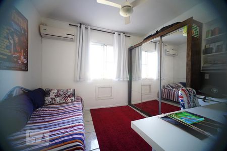 Dormitório 1 de casa de condomínio para alugar com 3 quartos, 110m² em Humaitá, Porto Alegre