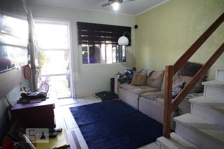 Sala de casa de condomínio para alugar com 3 quartos, 110m² em Humaitá, Porto Alegre