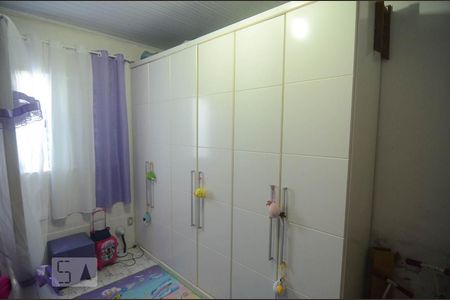 Quarto 1 de casa à venda com 3 quartos, 200m² em Guajuviras, Canoas