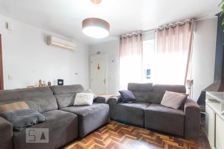 Sala de Estar de casa de condomínio à venda com 4 quartos, 250m² em Santo Antônio, Porto Alegre