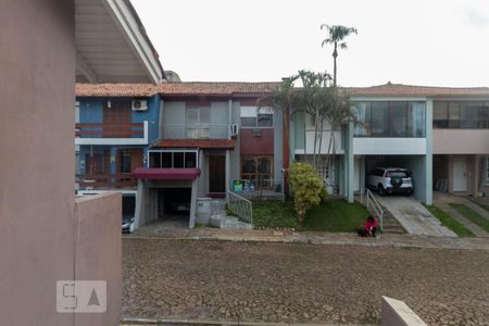 Vista da Suíte de casa de condomínio à venda com 4 quartos, 250m² em Santo Antônio, Porto Alegre