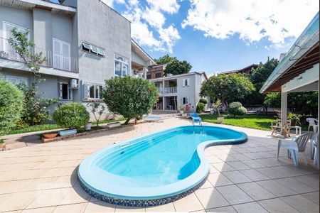 Piscina de casa à venda com 3 quartos, 290m² em Nonoai, Porto Alegre