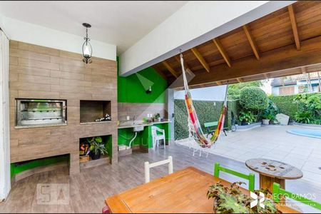 Varanda de casa à venda com 3 quartos, 420m² em Jardim Itu, Porto Alegre