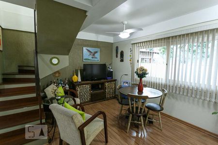 Sala de casa de condomínio à venda com 3 quartos, 99m² em Nonoai, Porto Alegre