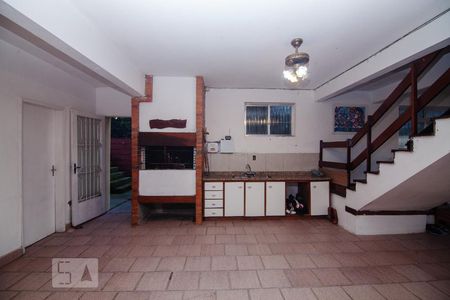 1_AREA DE CONVÍVIO GARAGEM de casa à venda com 4 quartos, 394m² em Vila Assunção, Porto Alegre