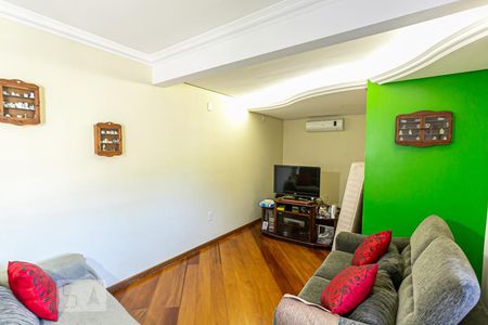 Sala de Estar de casa à venda com 5 quartos, 320m² em Vila Nova, Porto Alegre