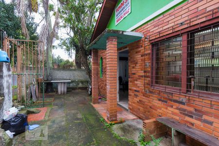 Fachada de casa à venda com 3 quartos, 150m² em Passo das Pedras, Porto Alegre