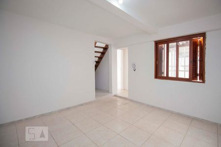 Sala  de casa de condomínio para alugar com 2 quartos, 70m² em Vila Jardim, Porto Alegre