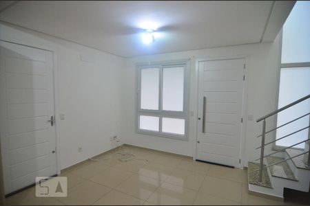 Sala de casa de condomínio à venda com 2 quartos, 80m² em Niterói, Canoas