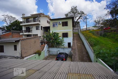 Sala - Vista de casa de condomínio à venda com 2 quartos, 70m² em Cristo Redentor, Porto Alegre