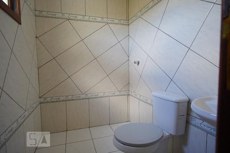 Banheiro de casa de condomínio à venda com 2 quartos, 70m² em Cristo Redentor, Porto Alegre