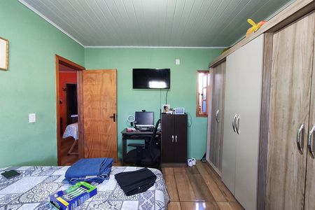 Quarto 2 de casa à venda com 4 quartos, 80m² em Guajuviras, Canoas