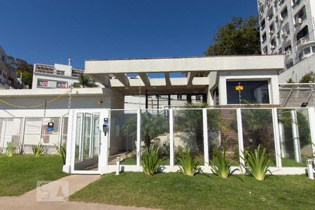 Fachada e portaria de casa de condomínio à venda com 3 quartos, 257m² em Praia de Belas, Porto Alegre