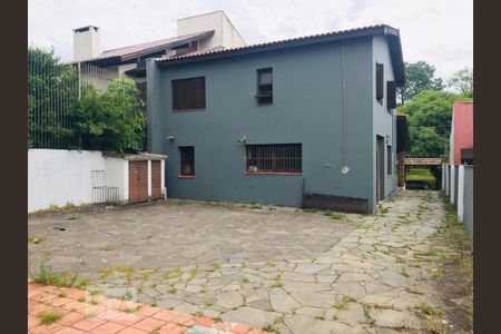 Fachada de casa à venda com 5 quartos, 316m² em Vila Assunção, Porto Alegre