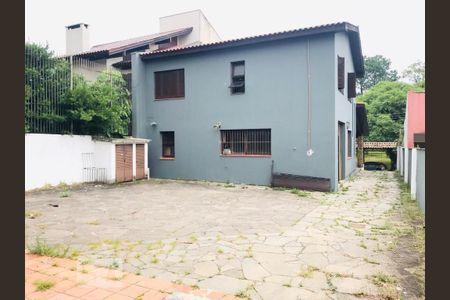 Fachada de casa à venda com 5 quartos, 316m² em Vila Assunção, Porto Alegre