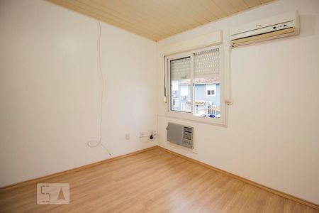 Quarto 1 de casa de condomínio à venda com 2 quartos, 78m² em Alto Petrópolis, Porto Alegre