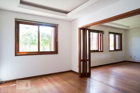 Sala de TV de casa à venda com 3 quartos, 220m² em Ipanema, Porto Alegre