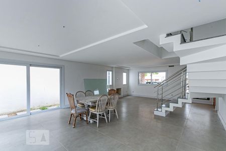 Sala de casa de condomínio à venda com 3 quartos, 478m² em Pedra Redonda, Porto Alegre
