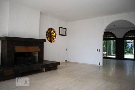 Sala de Estar de casa de condomínio à venda com 3 quartos, 550m² em Cavalhada, Porto Alegre