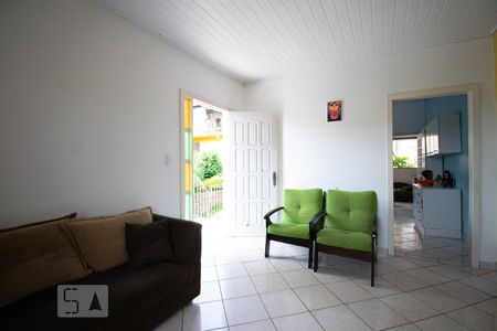 Sala de Estar de casa à venda com 2 quartos, 140m² em Vila Nova, Porto Alegre