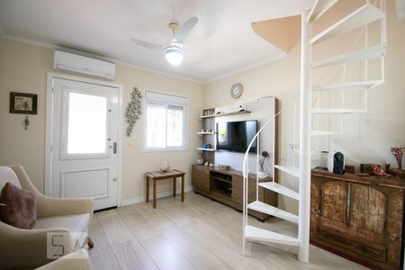 Sala de Estar de casa de condomínio à venda com 2 quartos, 112m² em Cavalhada, Porto Alegre