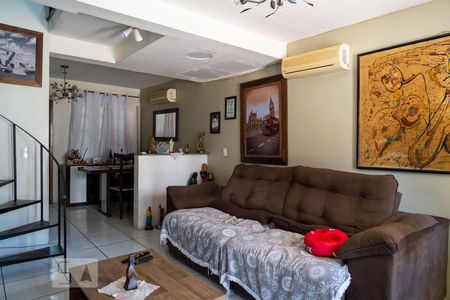 Sala de casa de condomínio à venda com 3 quartos, 104m² em Coronel Aparicio Borges, Porto Alegre