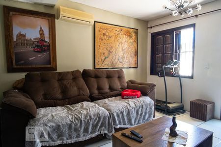 Sala de casa de condomínio à venda com 3 quartos, 104m² em Coronel Aparicio Borges, Porto Alegre