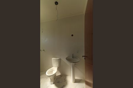 Banheiro da suíte 1 de casa de condomínio à venda com 3 quartos, 160m² em Aberta dos Morros, Porto Alegre