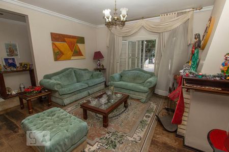 Sala de Estar de casa à venda com 3 quartos, 238m² em Jardim Itu, Porto Alegre