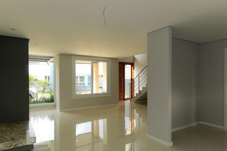 Sala de casa de condomínio à venda com 3 quartos, 140m² em Campo Novo, Porto Alegre