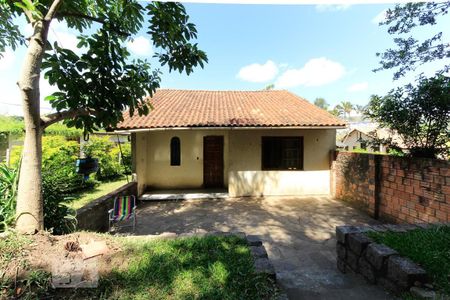 Fachada de casa à venda com 3 quartos, 2270m² em Vila Nova, Porto Alegre