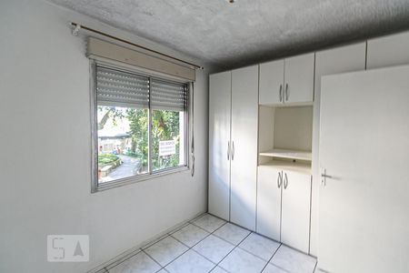 Quarto 1 de apartamento para alugar com 2 quartos, 44m² em Vila Nova, Porto Alegre